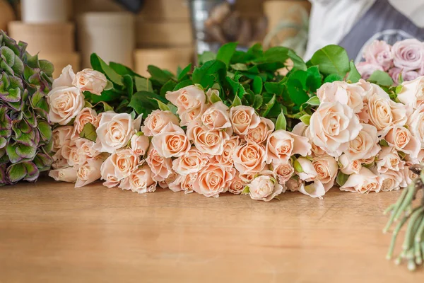 Flower shop background. Fresh roses for bouquet delivery