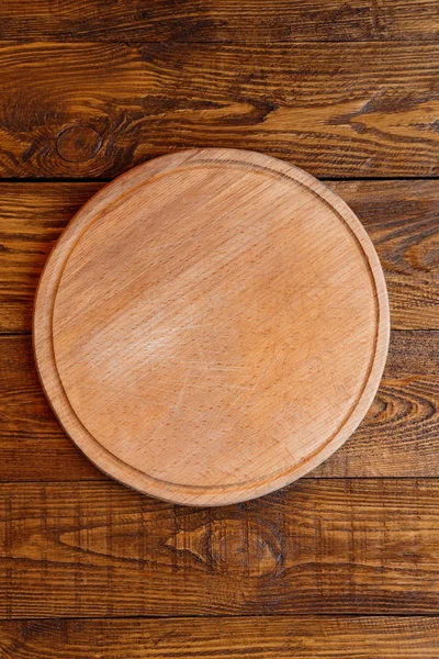 Wooden round board for pizza — Stock Photo, Image