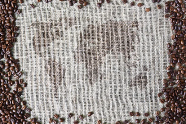 Jute patroon met koffiebonen grens en wereld kaart — Stockfoto