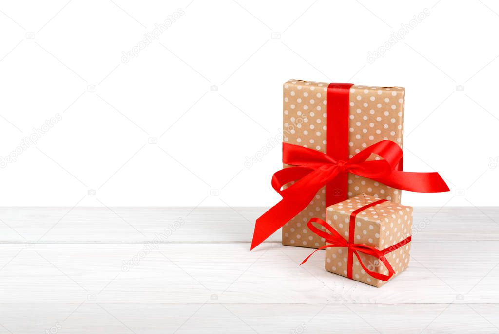Birthday holiday gift box in wrapping paper isolated on white