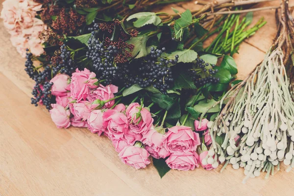 Flower shop background. Fresh roses for bouquet delivery