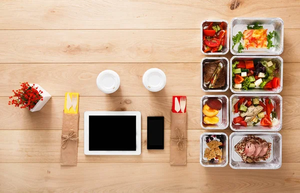 Healthy food take away in boxes, top view at wood — Stock Image Healthy food take away in boxes, top view at wood Royalty Free Stock Photos