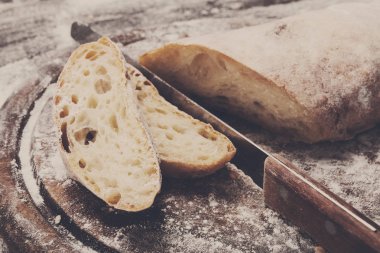 Fırın kavramı arka plan. Bıçak kesim ekmek ekmek dilimleri