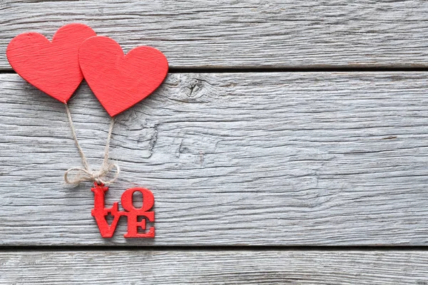 Valentine day background, handmade hearts on wood with copy space — Stock Photo, Image