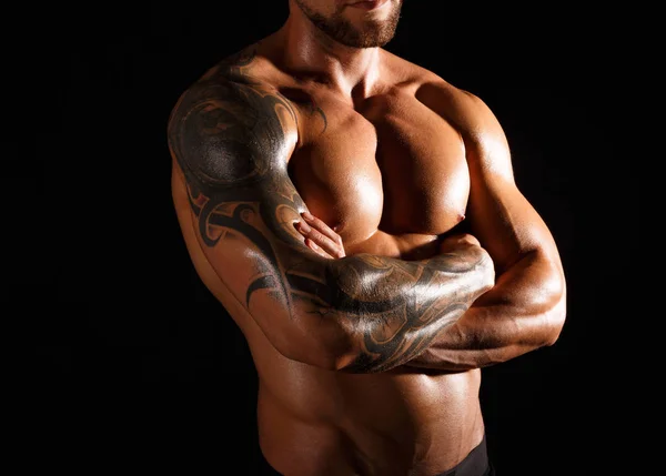 Strong athletic man showes naked muscular body — Stock Photo, Image