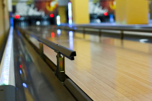 Bowling alley background, lane with bumper rails — Stock Photo, Image