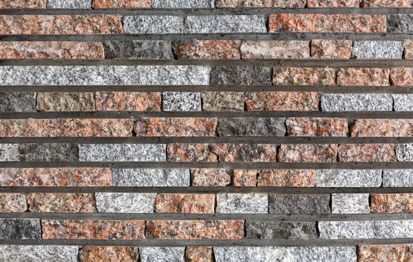 Modern decorative colored stone brick wall background — Stock Photo, Image