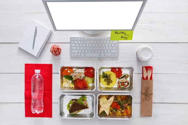 Healthy daily meals in office, top view at wood — Stock Photo, Image