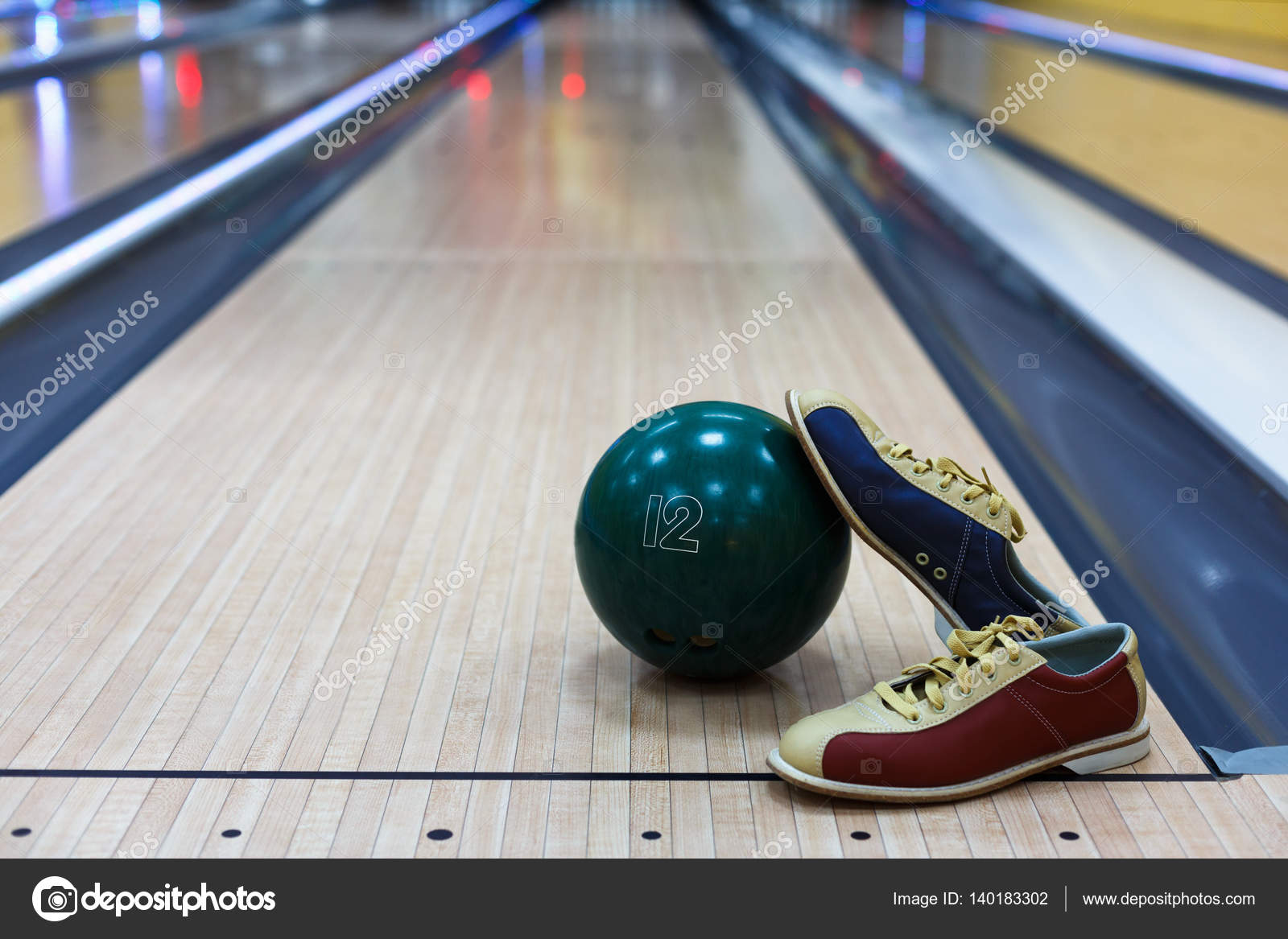Bowling ball and shoes on lane background Stock Photo by ©Milkos 140183302