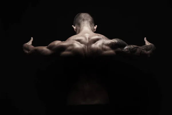 Homem irreconhecível mostra forte pescoço músculos closeup — Fotografia de Stock