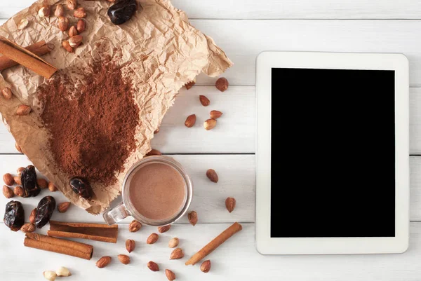 Chocolate smoothie ingredients on white wood with tablet screen — Stock Photo, Image
