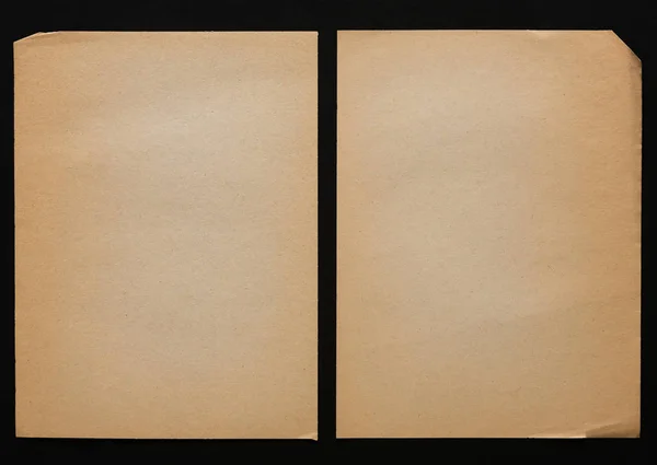 孤立在黑色背景上的棕色纸页 — 图库照片