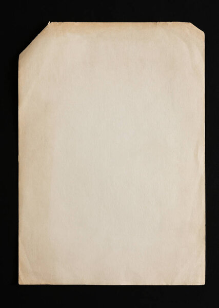 old craft paper sheets pile isolated on black background