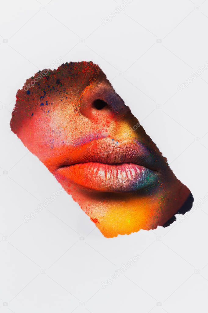 Lips of model with colorful art make-up, close-up