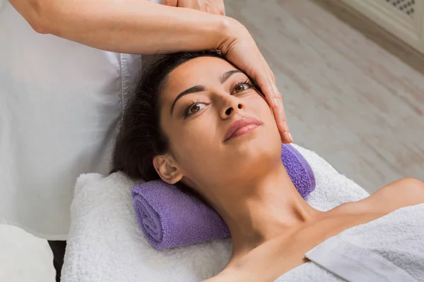 Woman massagist make face lifting massage in spa wellness center — Stock Photo, Image