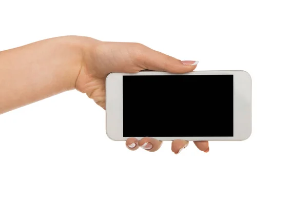 여성의 손을 잡고 빈 휴대 전화 화면 — 스톡 사진