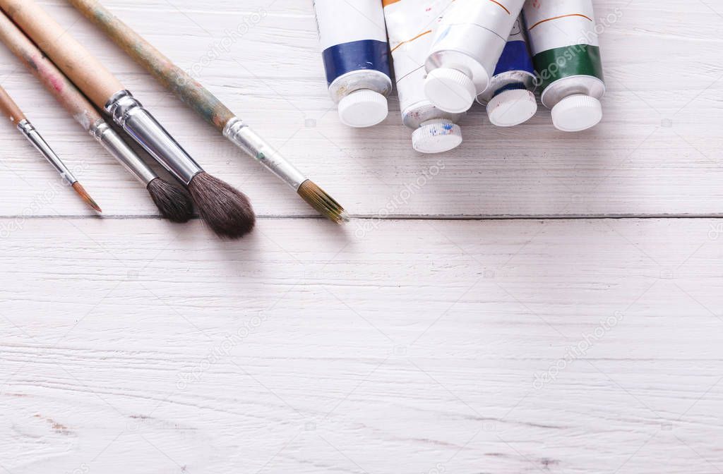 Tools for drawing, brushes and oil-paint tubes