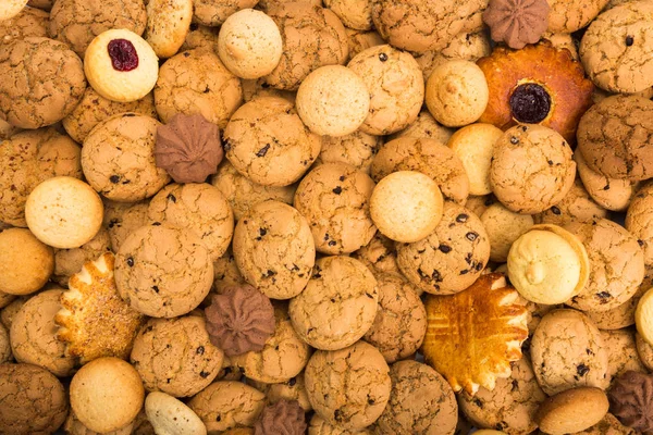 Un montón de galletas y galletas de fondo — Foto de Stock