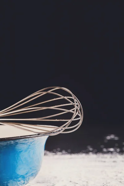 Kitchen whisk, hand tool for whipping cream — Stock Photo, Image