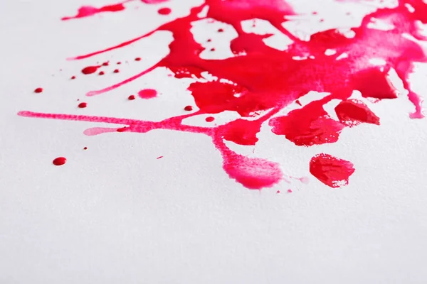 Salpicos de tinta aquarela abstrata na textura do papel — Fotografia de Stock