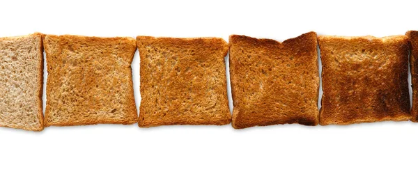 Pişmiş ve yanmış tost. Toastiness üzerinde beyaz derecesini — Stok fotoğraf