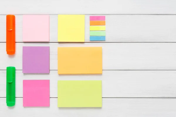 Flat lay of stationery supplies on rustic wood — Stock Photo, Image