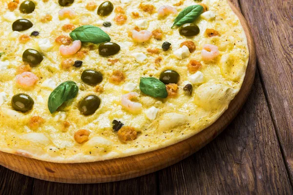 Italian seafood pizza at wood background — Stock Photo, Image