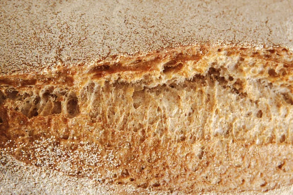 Bread texture background, closeup of baguette loaf