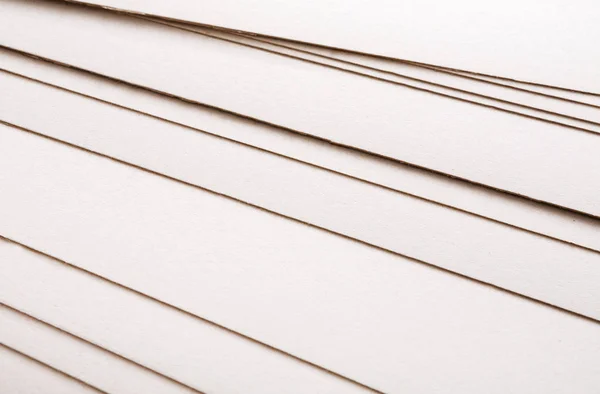 Papierbögen stapeln sich in Nahaufnahme, abstrakter Hintergrund — Stockfoto