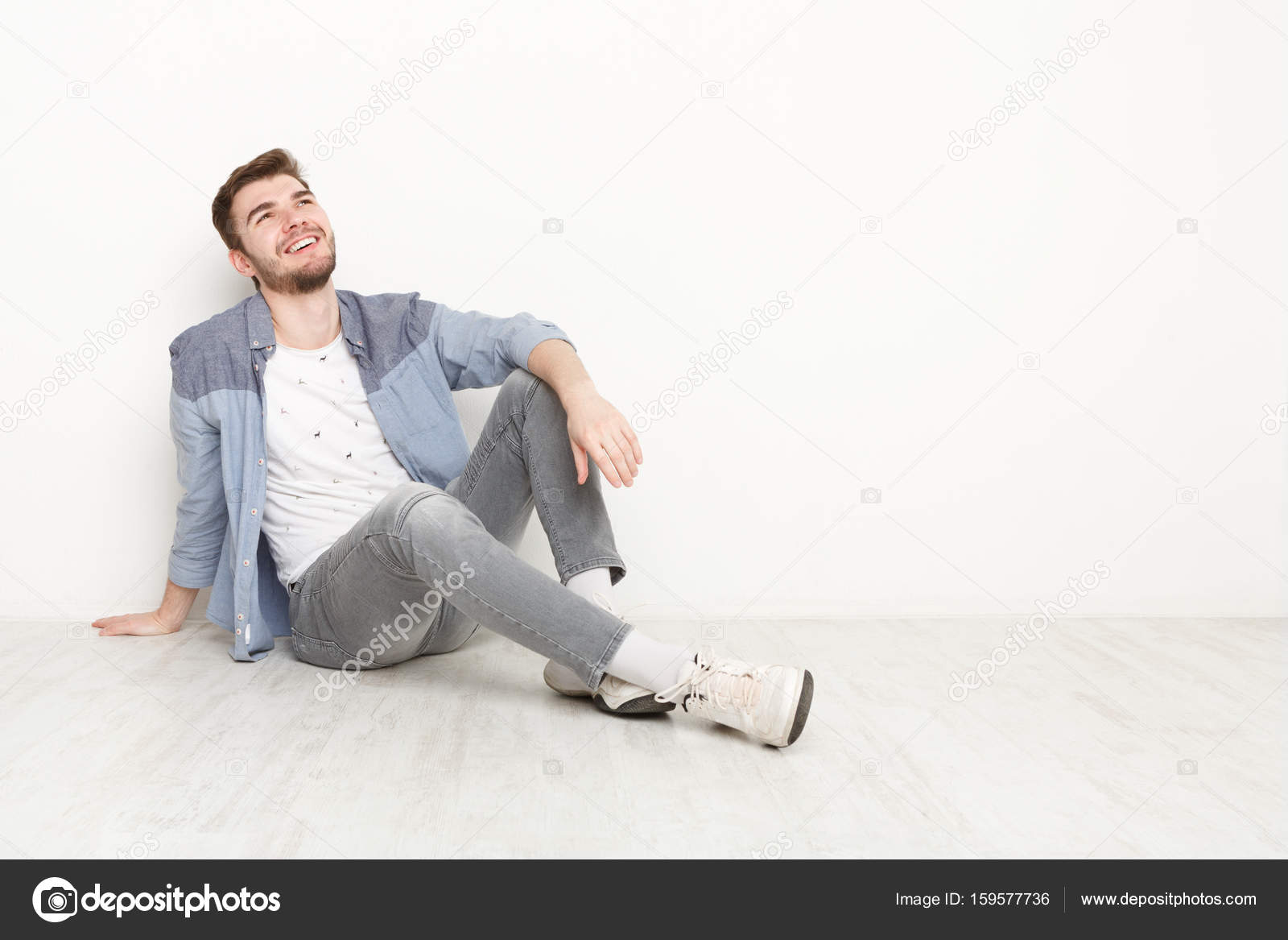 man sitting on ground