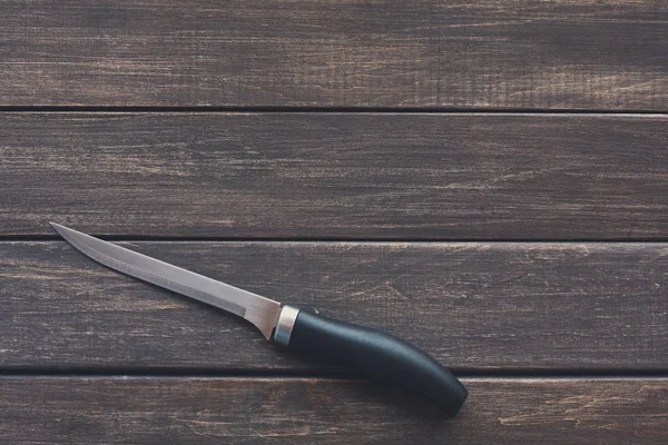 Rustik ahşap arka plan, kopya alanı üzerinde bıçak