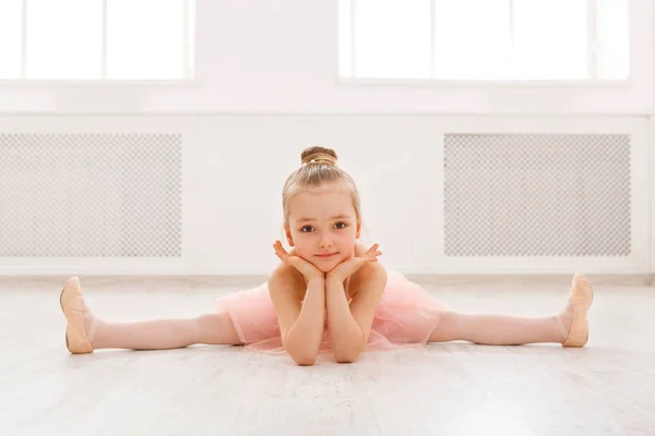 Portrait of little ballerina on floor, copy space — Stock Photo, Image