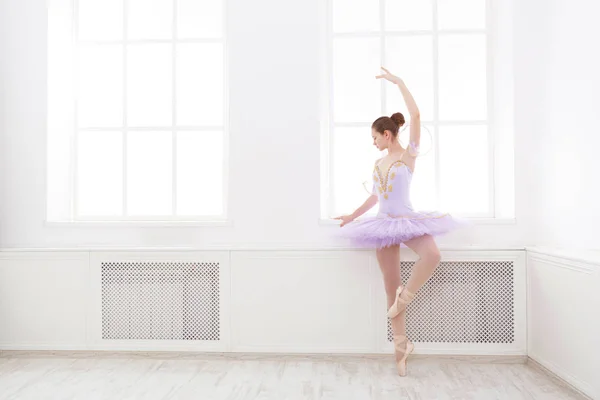 Ballet student exercising in ballet costume — Stock Photo, Image