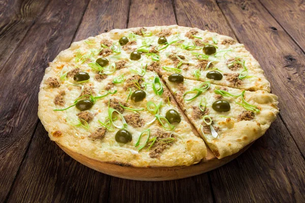 Delicious seafood pizza with tuna and olives — Stock Photo, Image