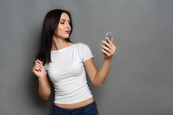 Woman taking photo with gadget, communication — Stock Photo, Image