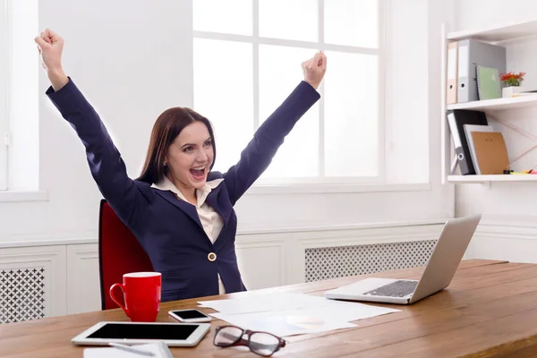 Business woman enjoying successful project Stock Picture