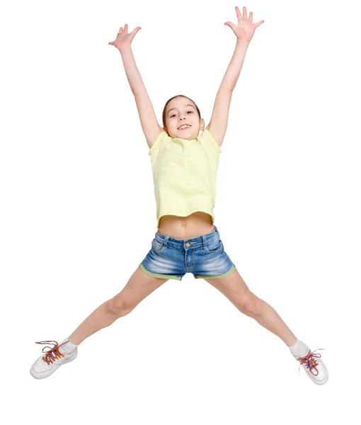 Ευτυχισμένος εφηβικό κορίτσι που άλματα σε άσπρο φόντο απομονωμένες — Φωτογραφία Αρχείου