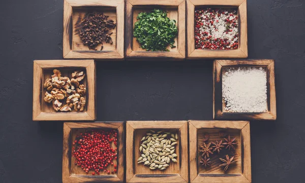 Diverse spices in a wooden box closeup — Stock Photo, Image