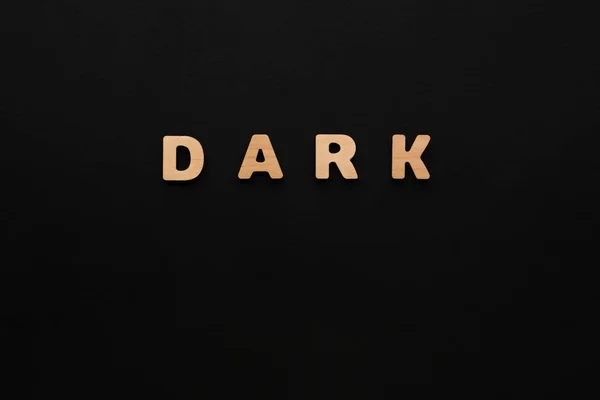 Dark słowo na czarnym tle — Zdjęcie stockowe