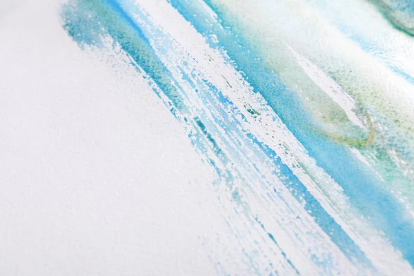 Watercolor paint brush strokes on paper texture — Stock Photo, Image