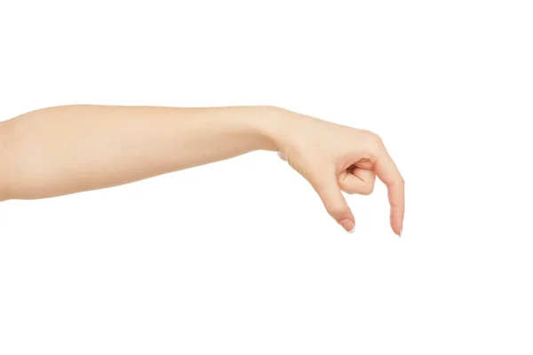 Vrouwelijke hand oppakken van iets, bijsnijden, knipsel — Stockfoto