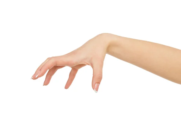 Vrouwelijke hand oppakken van iets, bijsnijden, knipsel — Stockfoto