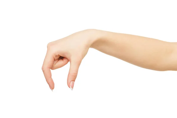 Weibliche Hand, die etwas aufhebt, schneidet, schneidet — Stockfoto