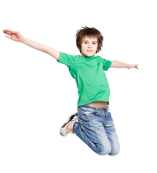 Happy laughing boy jumping on white isolated background — Stock Photo, Image