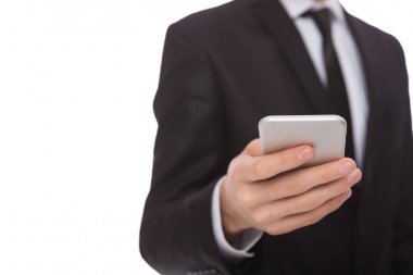 Smartphone ile takım elbiseli tanınmaz işadamı
