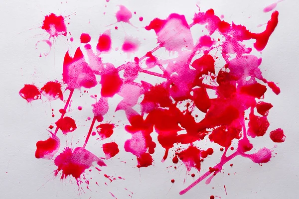 Salpicos de tinta aquarela abstrata na textura do papel — Fotografia de Stock