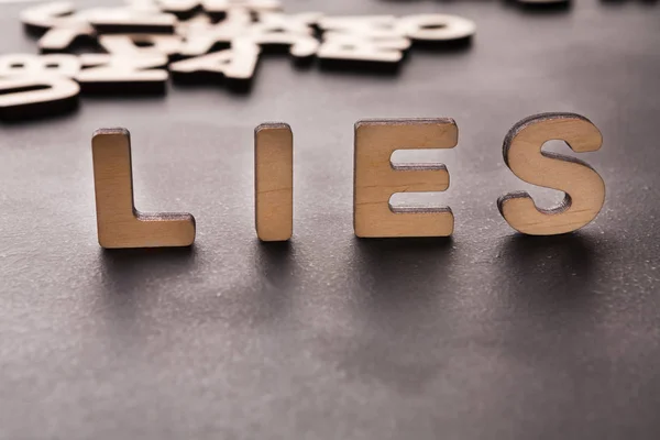 Word Lies standing on table — Stock Photo, Image