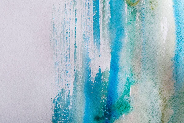 Watercolor paint brush strokes on paper texture — Stock Photo, Image