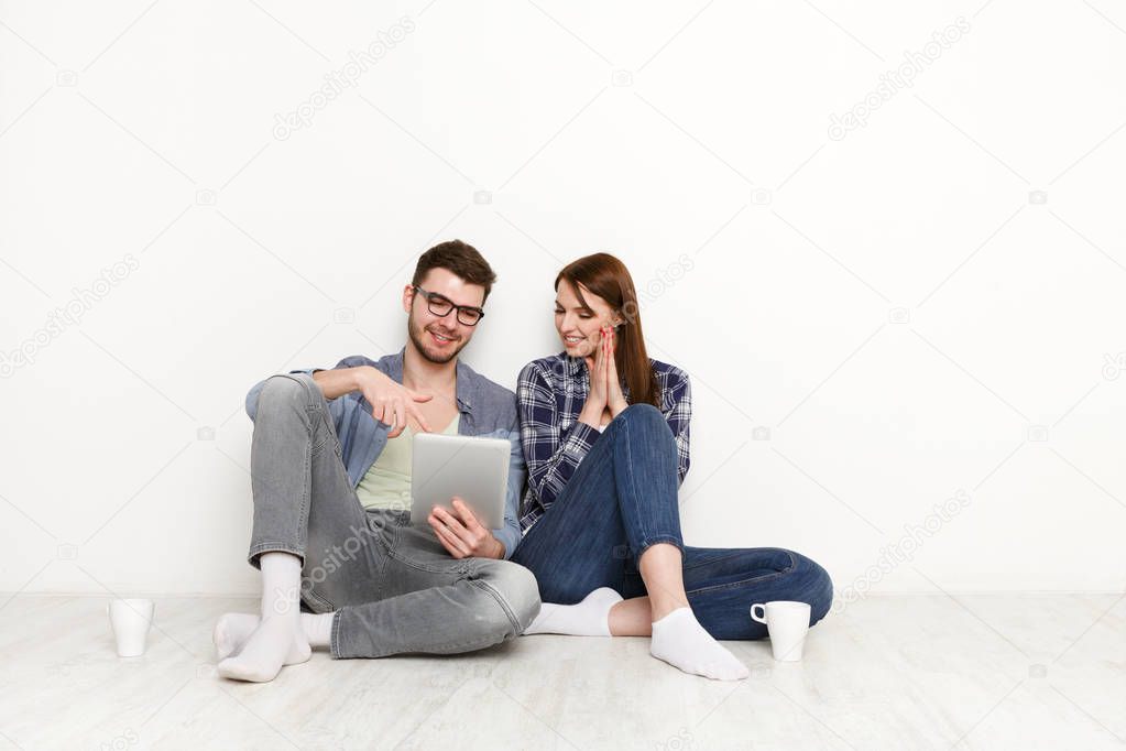 Couple making order at food delivery web site, online order