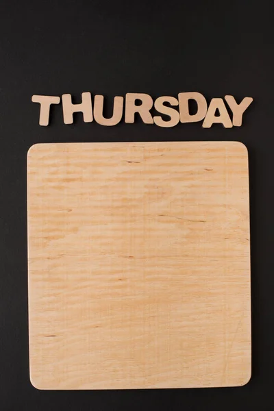 Word Thursday with blank wooden board — Stock Photo, Image